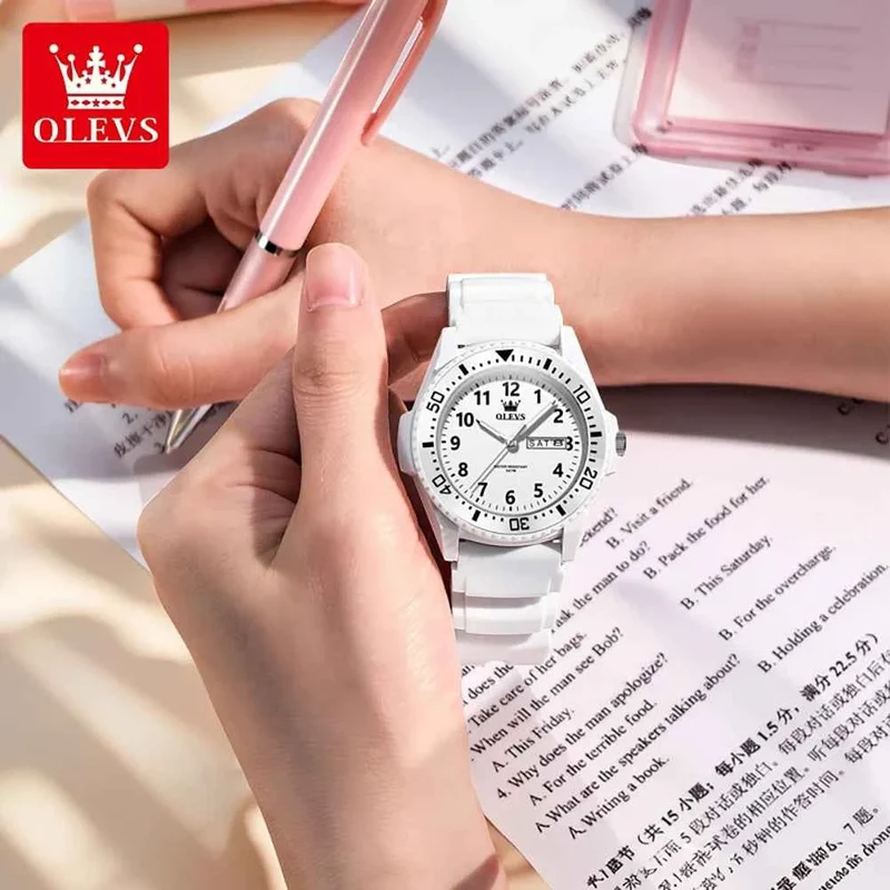 Orologio OLEVS 2703 con movimento al quarzo, doppio calendario, cinturino in silicone e impermeabile fino a 30 metri, ideale per studenti.