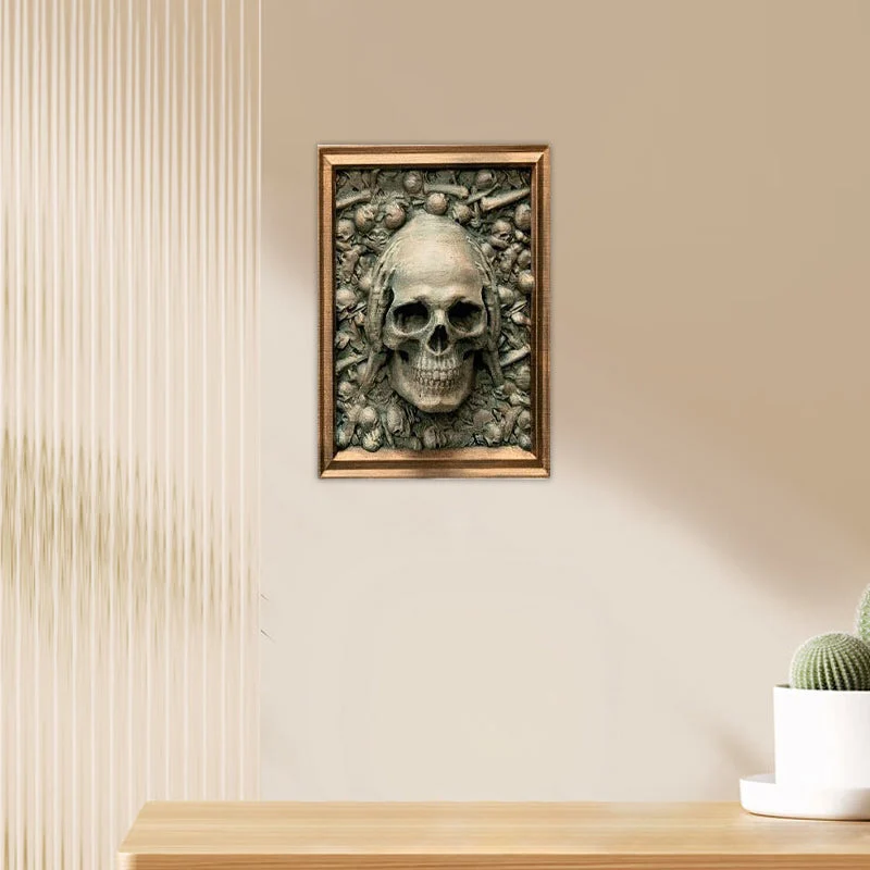 Wanddecoratie – Drie schedels in hars met gouden accenten en ophanghaak