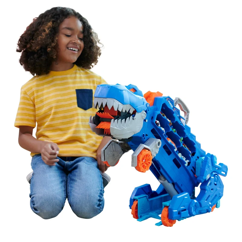 Hot Wheels City 'Let's Race' Netflix - Mega Dino Trasportatore, pista da corsa che si trasforma in un T-Rex, playset con luci e suoni, box per riporre 20 macchinine in scala 1:64, 4+ anni, HNG50
